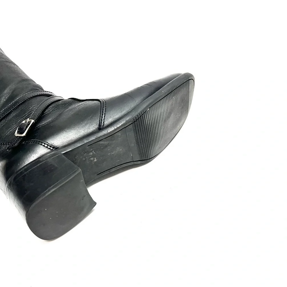 Vintage 1990s black leather knee high wool lined heeled winter fashion boots